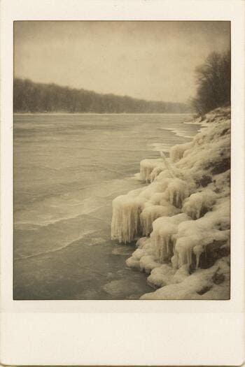 Polaroid-style photo of an angler sitting at the edge of a frozen lake.